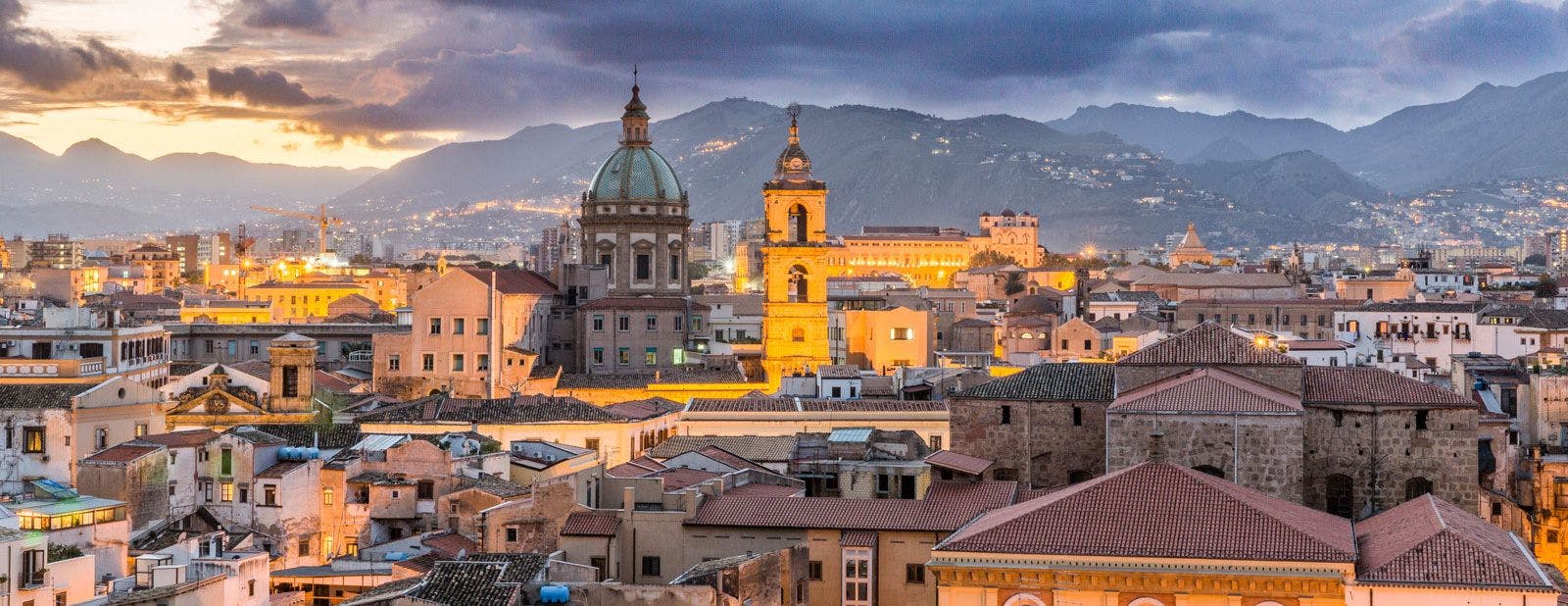 Palermo city skyline in Sicily with mountains in the background