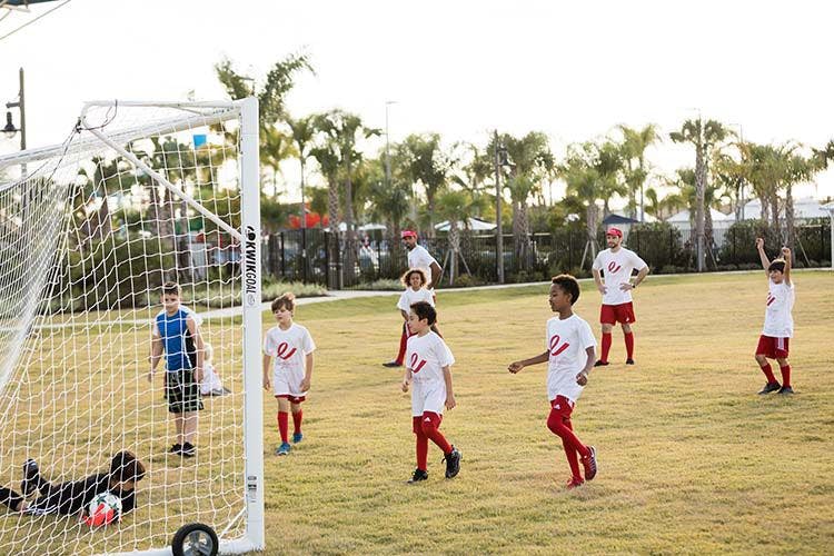 A young soccer team on a Florida pitch