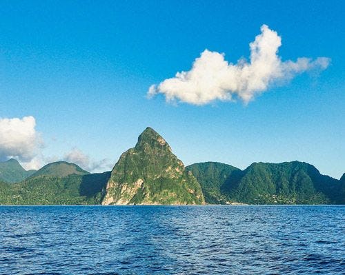The Pitons mountains from the sea in St Lucia