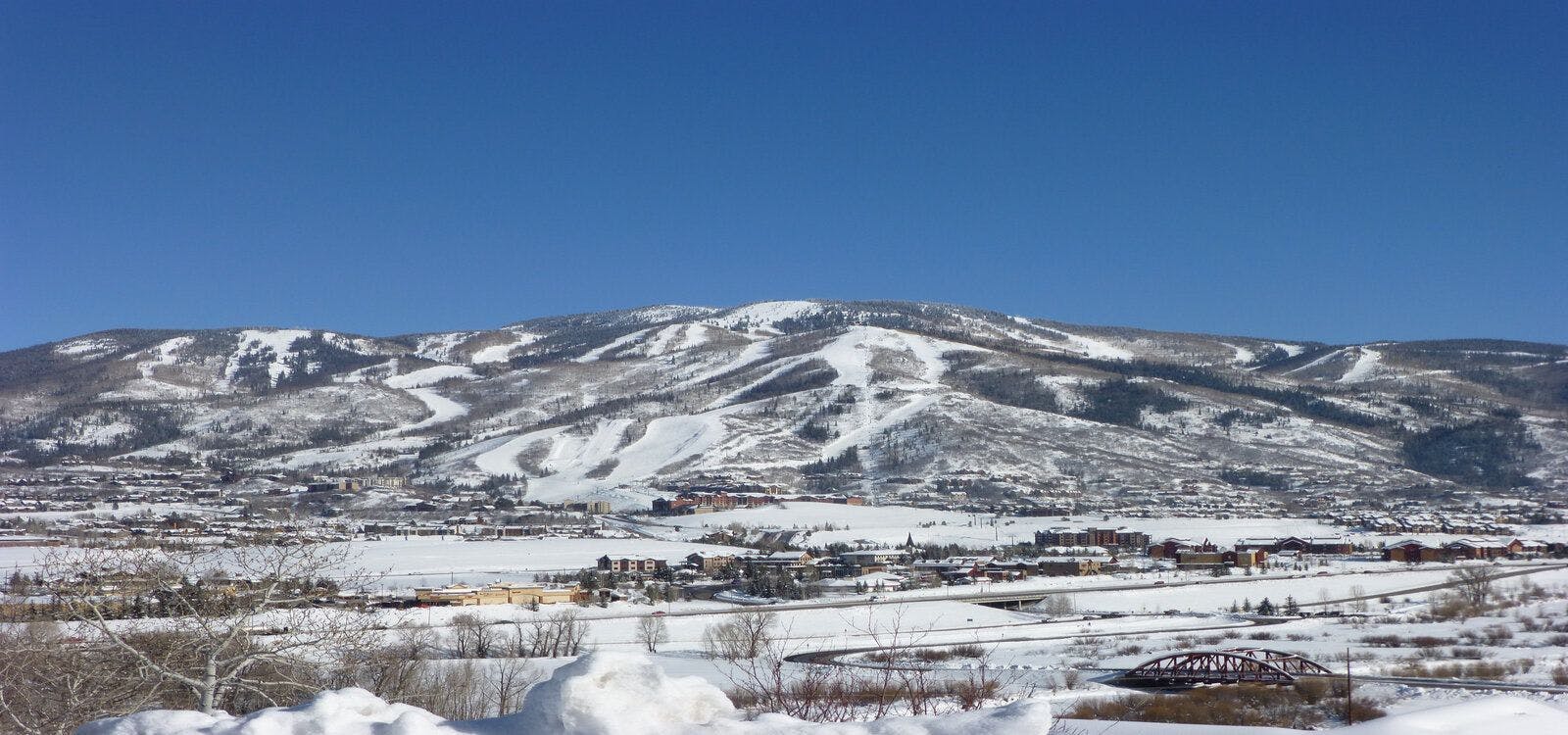 Snowy scenery surrounding vacation homes in Steamboat Springs, CO
