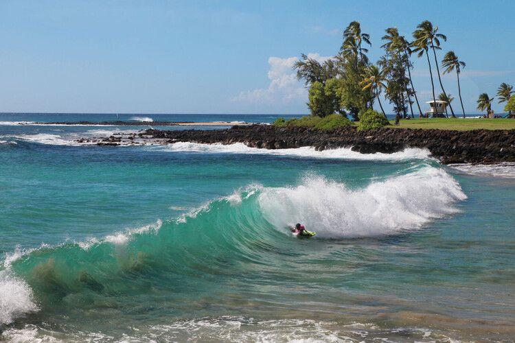 Surfing in Koloa, Hawaii, vacation rentals