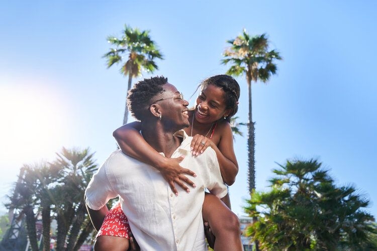 Tampa vs Miami vacation, happy couple in Florida