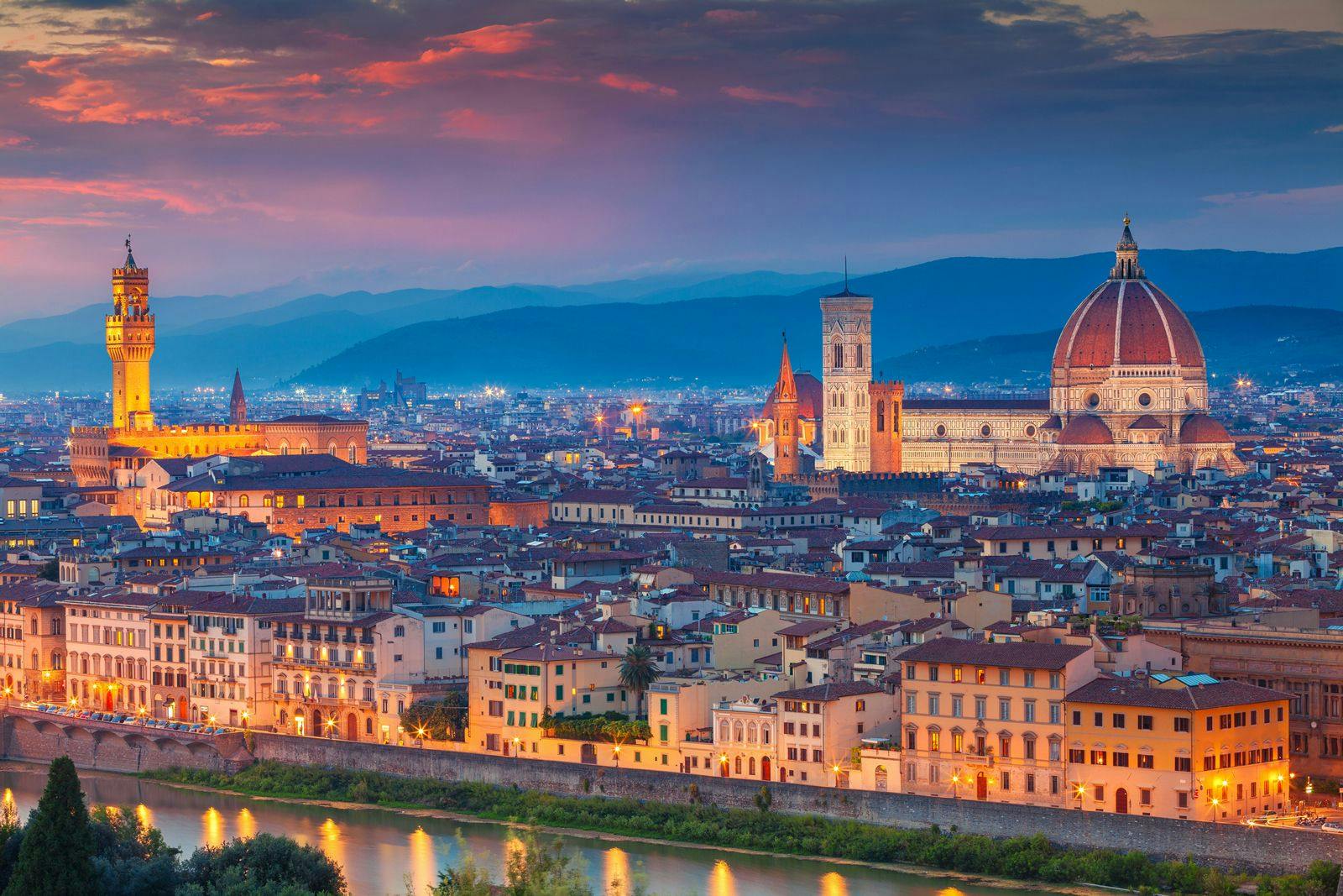 Dusk skyline view of the city of Florence in Italy with domed cathedral and tower