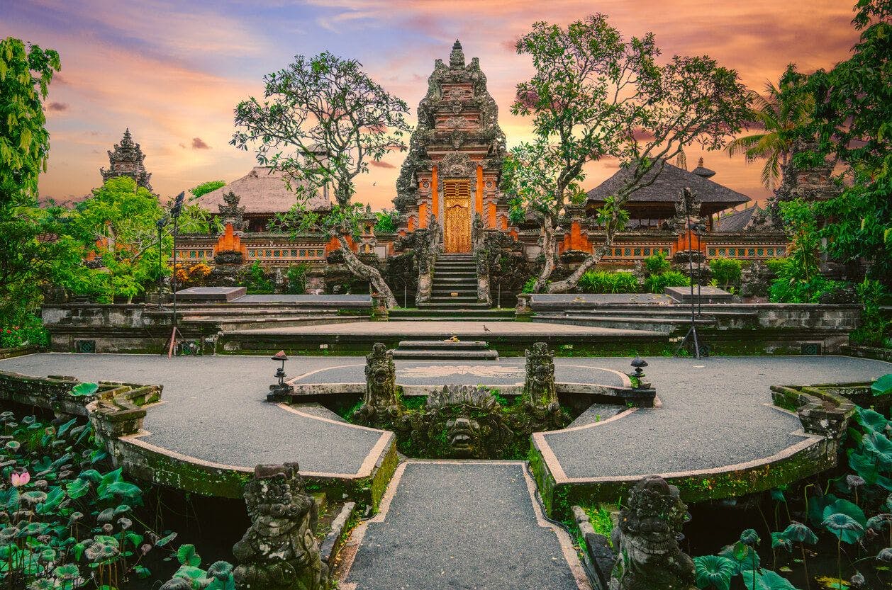An amazing sunset view over a balinese hindu temple