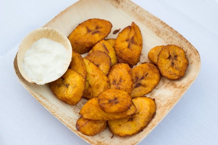 Fried plantain diss with a white dipping sauce