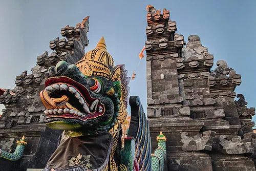 The temple of Tanah Lot, with a dragon statue