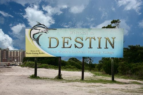 Sign for Destin with a sail fish on it
