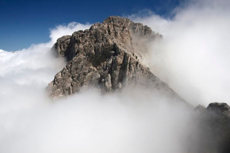The summit if Mount Olympus covered in cloud