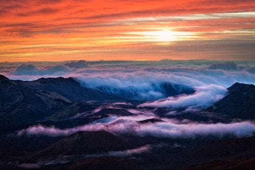 Sunset above the clouds on Mount Haleakala