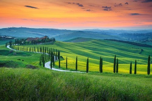 Sunset over the rolling hills of Tuscany