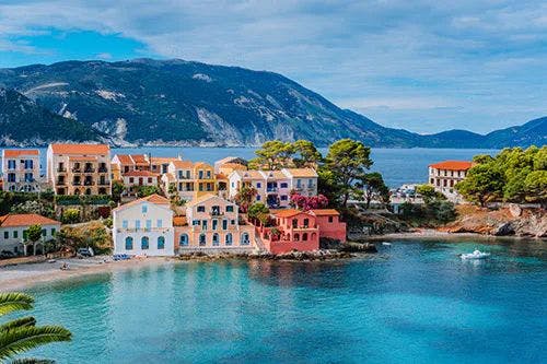 The colorful buildings of Assos by the sea