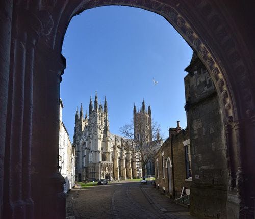 Canterbury Cathedral through a stone archway