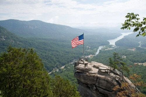 The American flag flying over Chimney Rock
