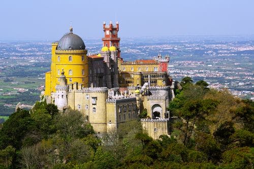 Pena Palace in Sintra, a colorful red and yellow castle