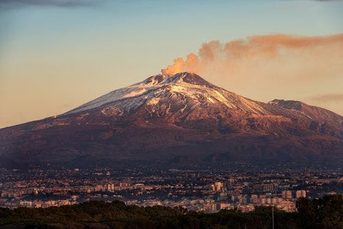 Gently smoking Mt Etna volcano