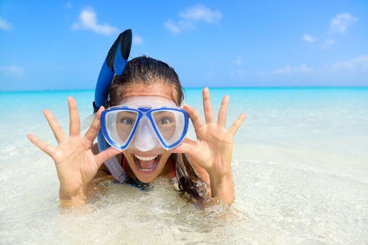 An excited snorkeler in Turks and Caicos