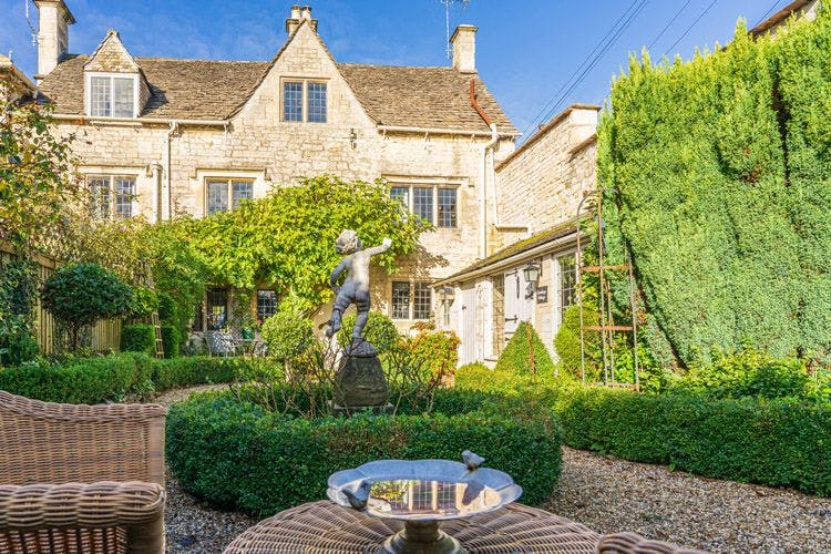 Loveday Cottage UK vacation rental - a traditional stone house with courtyard garden and statue
