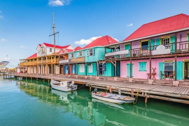 Colorful buildings in an Antigua town by the sea