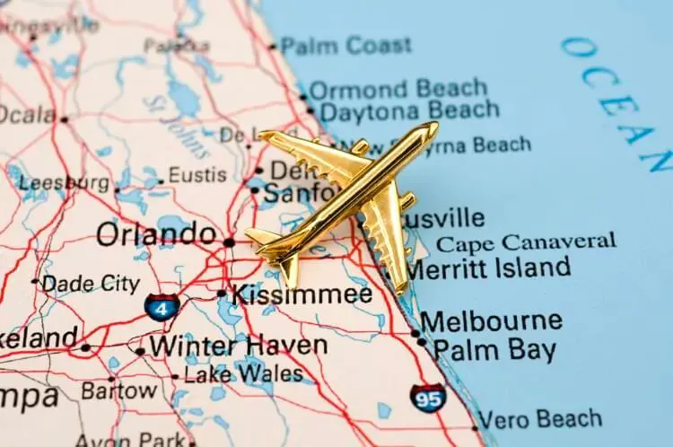 A golden plane model on a map of Florida