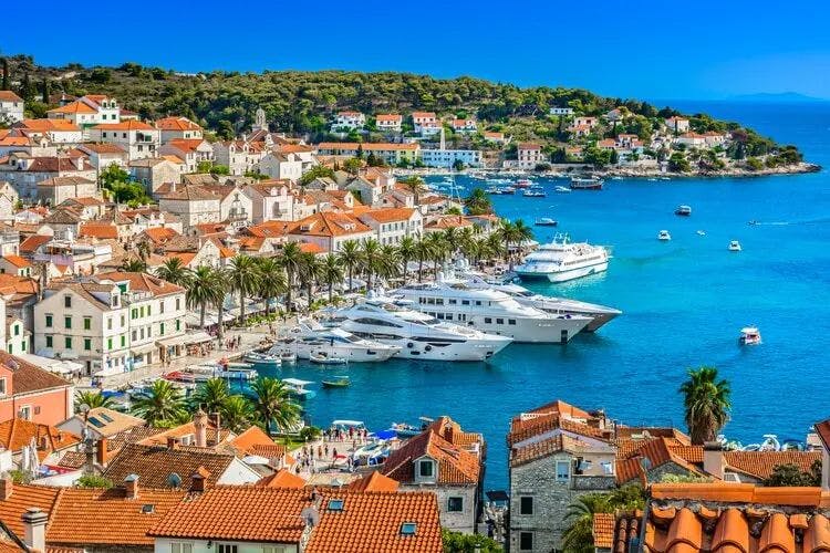 Croatia town on the coast with yachts in the harbor