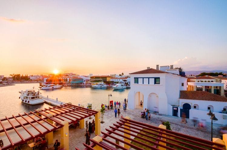 Sunset over a traditional seafront village in Cyprus