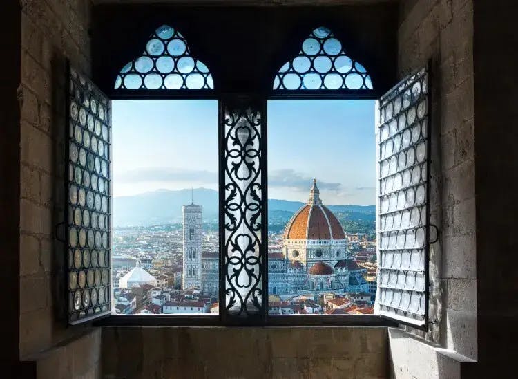 View of Florence Cathedral through an ornate window