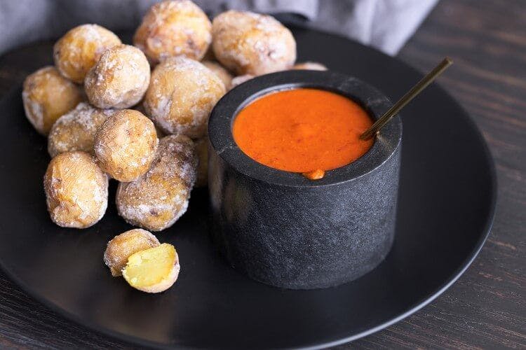 Traditional wrinkly Canarian potatoes and red mojo sauce
