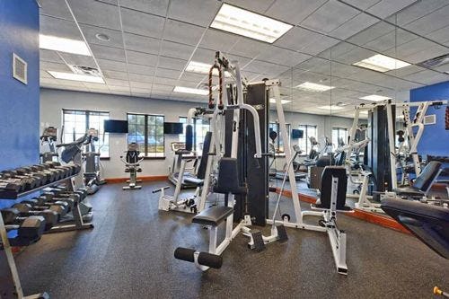 Paradise Palms Resort gym with assorted equipment 