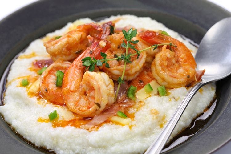 A dish of shrimps and grits