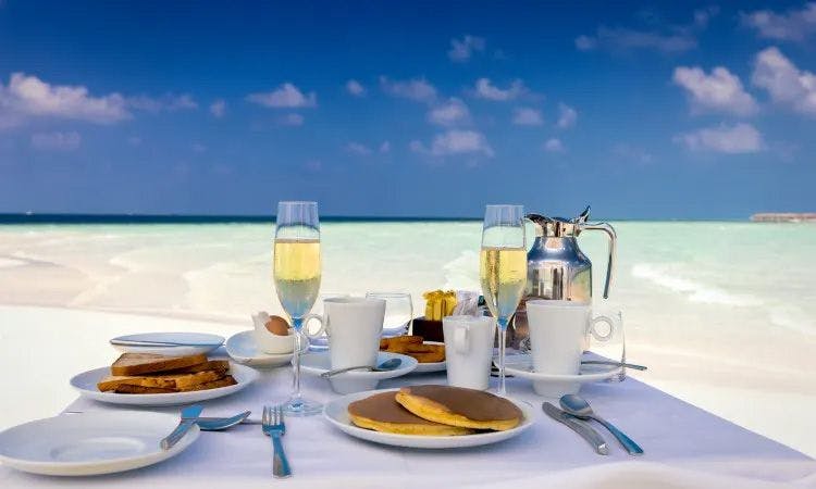 A table set for breakfast by the sea
