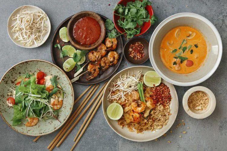 An overhead shot of various Thai dishes