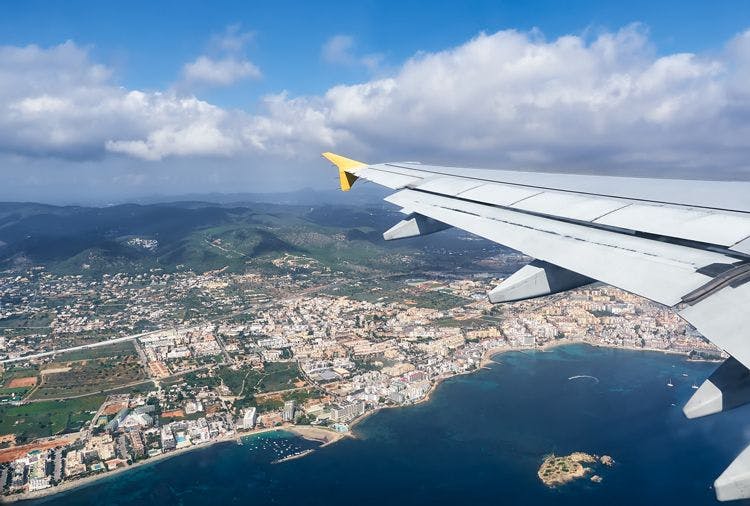 View of Spanish coastal city from a plane window