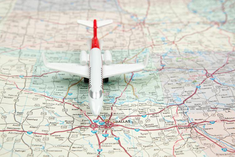 A model plane on a map of Texas