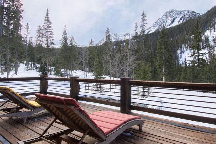 Vacation rentals in the New Mexico mountains - Taos Ski Valley  7 outdoor porch with chairs and mountain views