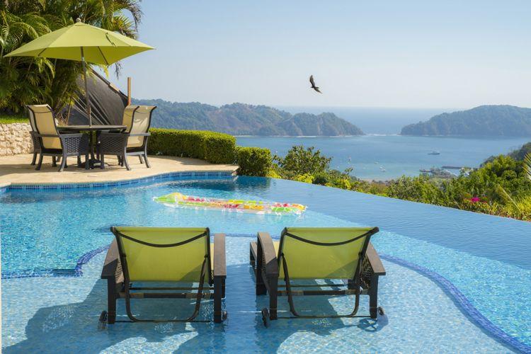 Villas in Costa Rica with pools Costa Rica 54 private pool with sunbeds and inflatable lido overlooking the rainforest and sea