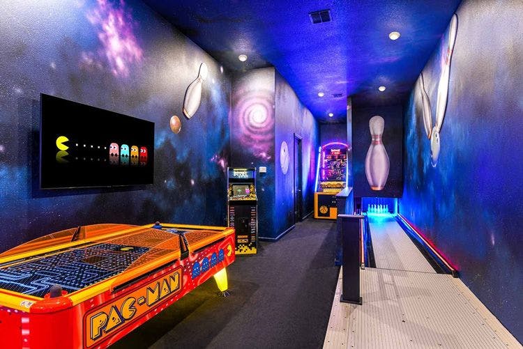 Villatel Village 13 vacation rental game room with space theme