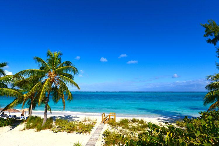 Steps leading onto Grace Bay Beach in Turks and Caicos
