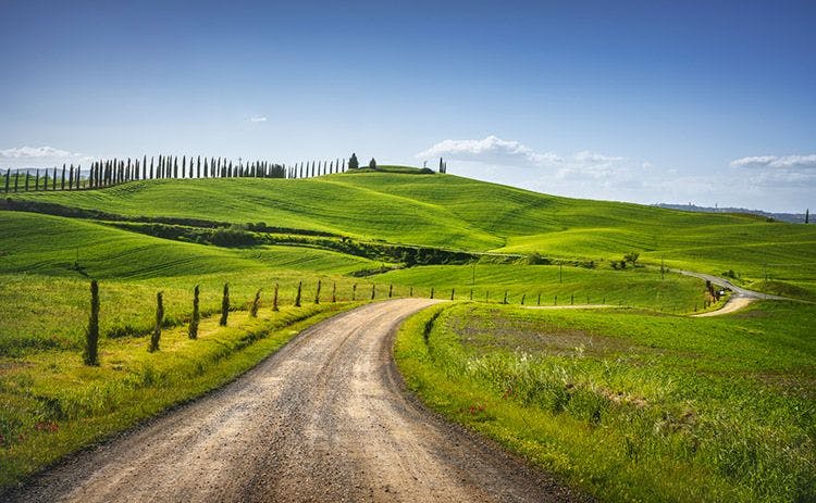 A road snaking through the Tuscan countryside 