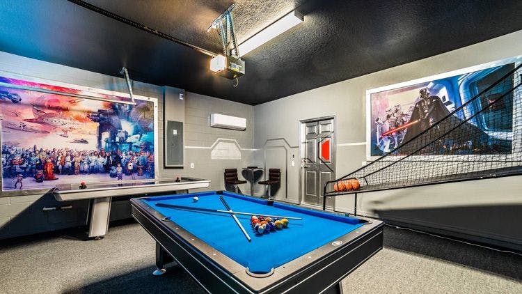 Windsor at Westside 32 game room with pool table and indoor basketball