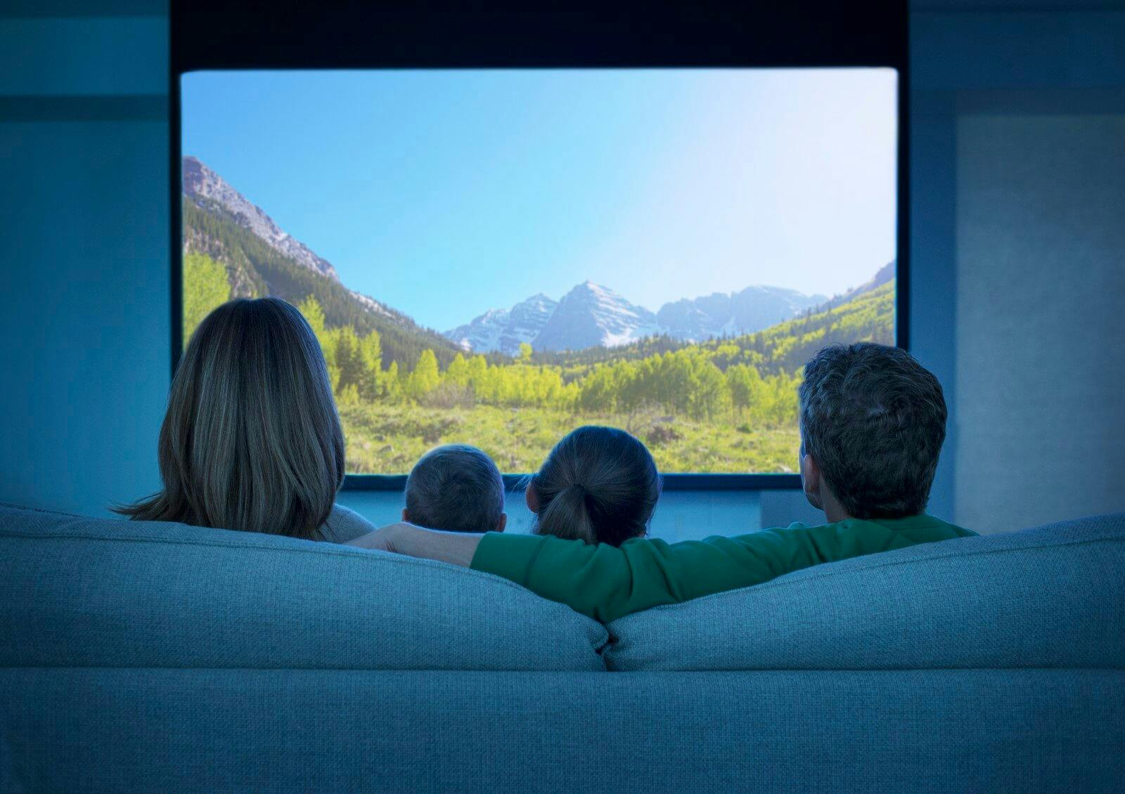 family watching a tv screen