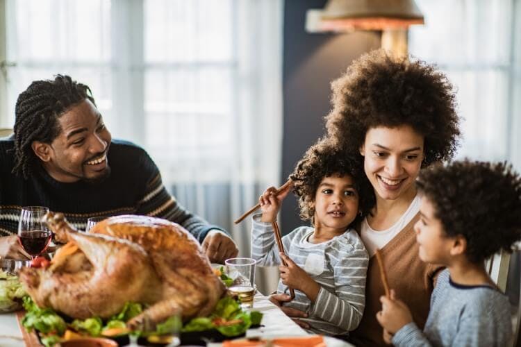 A family enjoying a Thanksgiving meal