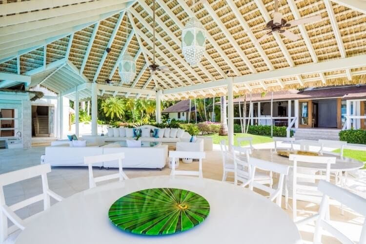 white tables in covered outdoor area