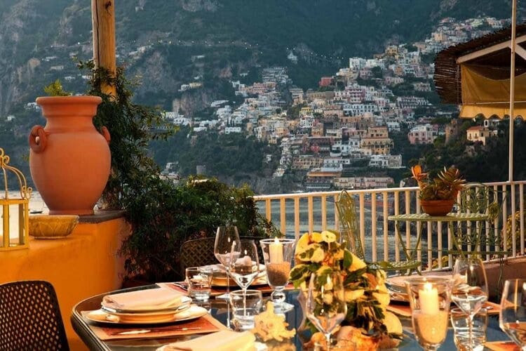 balcony of a villa with views over an amalfi coast town