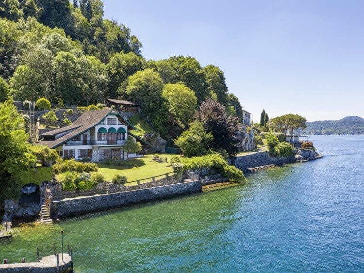Villa Cinderella 5 vacation rental in Lake Maggiore, a lakefront villa with landscaped gardens and dense woodland behind
