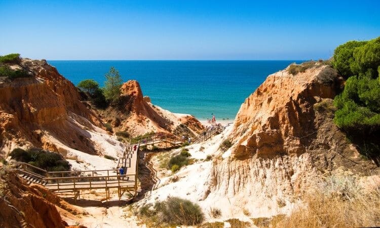 White sandy beach near Olhos De Agua in the Algarve, Portugal