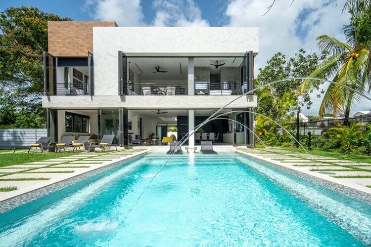 modern villa with pool and fountain