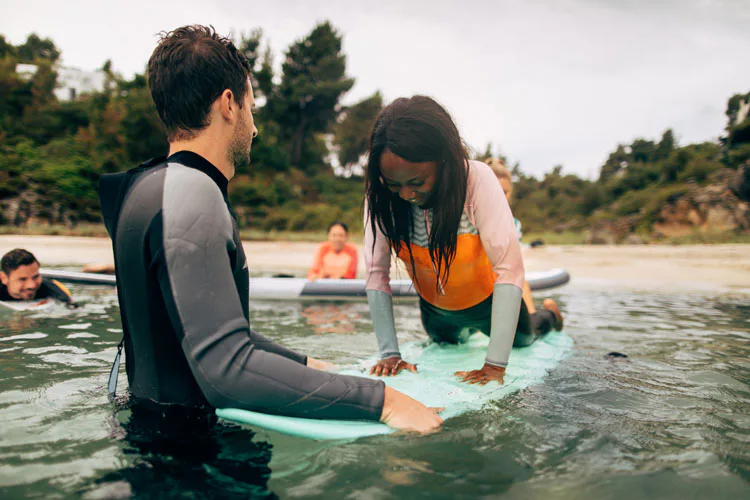 Surfing lessons with Top Villas concierge