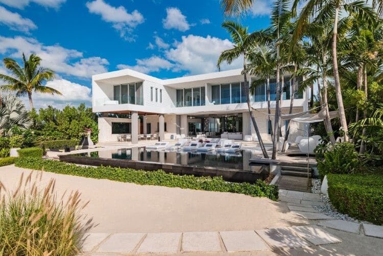 modern white villa with pool