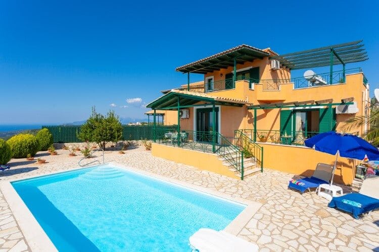 orange and green villa by the sea with pool