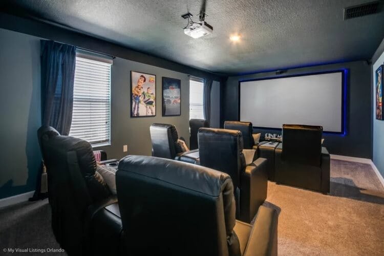 black home movie theater with toy story poster